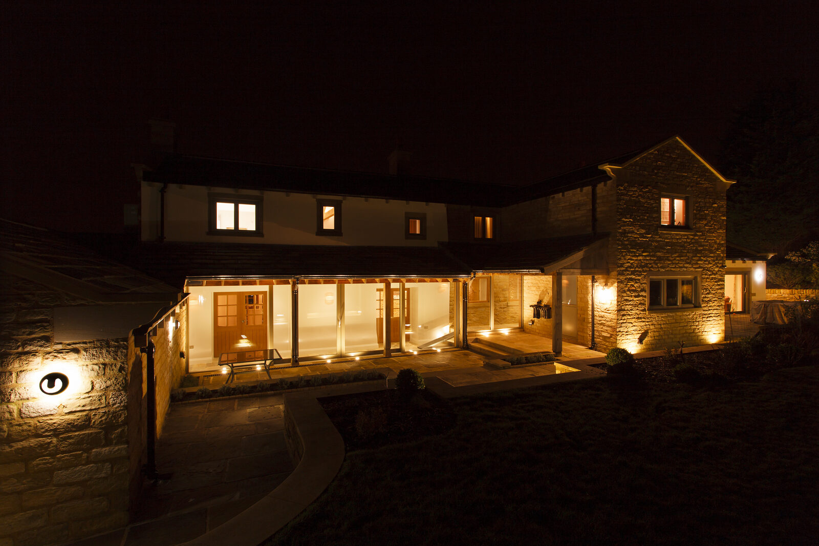 House extension rear elevation at night